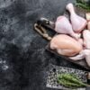 Raw chicken portions for cooking and barbecuing with skinless breasts, drumstick and wings