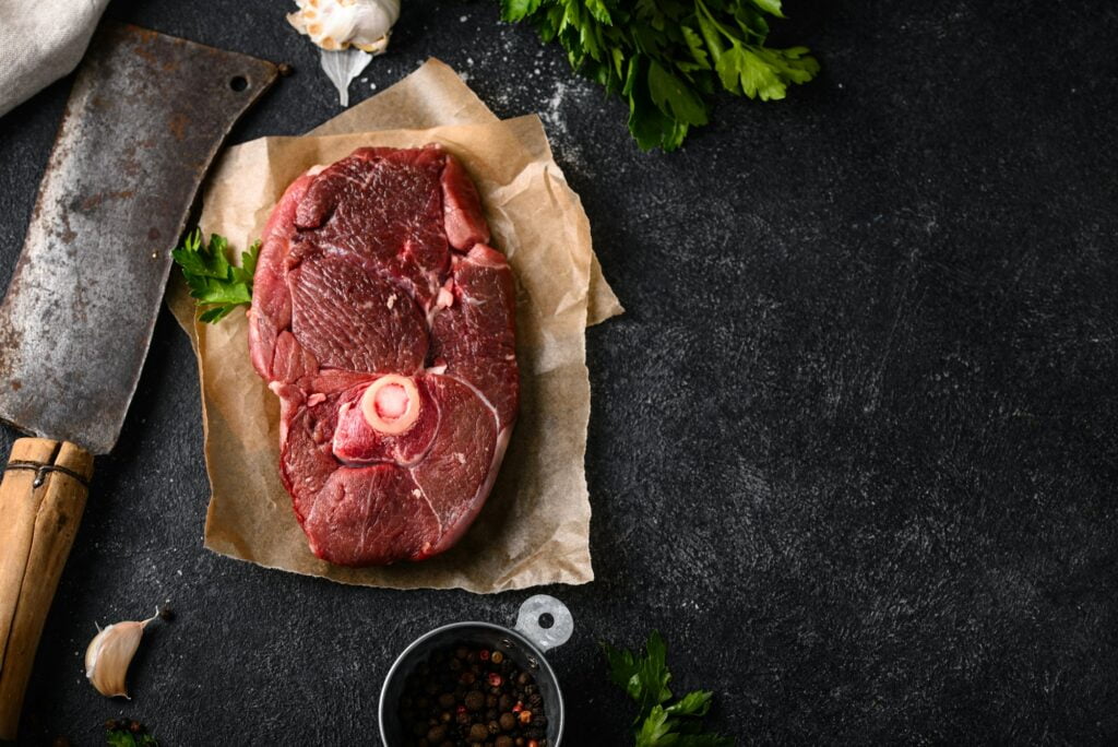 Raw uncooked lamb steak with spices