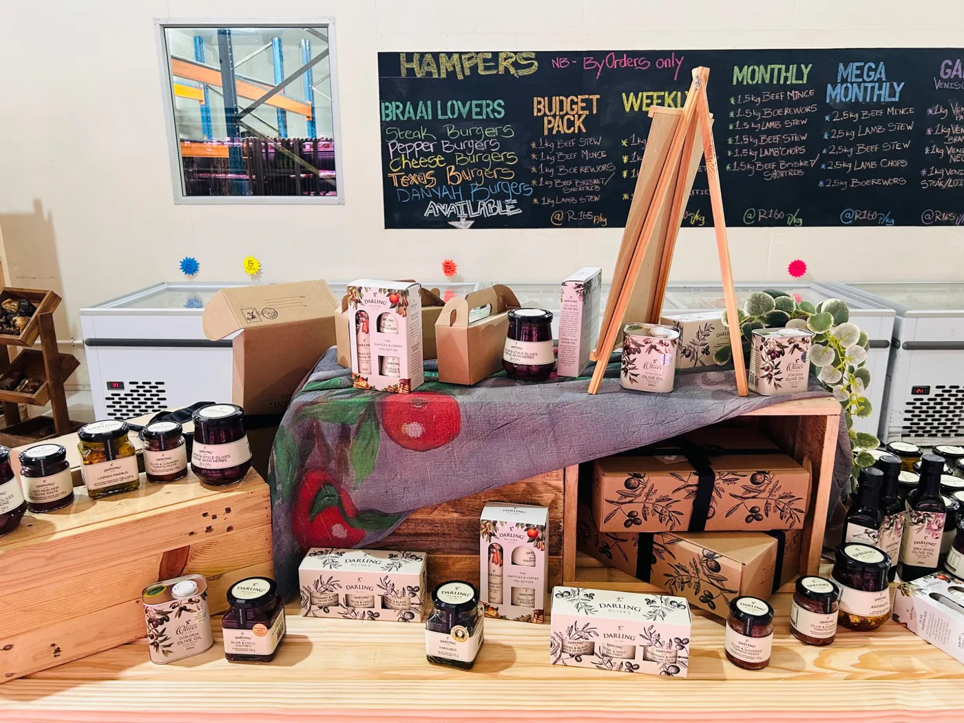 A Fresh Look at NamDeli – Same Favourites, More to Discover 3 Speciality olives, olive oils, chutneys and gift packs displayed at NamDeli